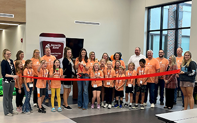 Security Bank recently opened an in-school savings bank branch at Laurel Concord Coleridge School. Student tellers and bank staff held a grand opening ribbon-cutting ceremony.